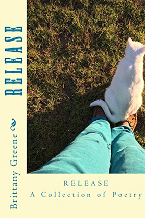 Image of a book cover titled Release: a collection of poetry by brittany greee. The background is yellow and there is an image of a white cat, green grass, and a pair of legs with teal sweatpants. the sweatpants have holes in them